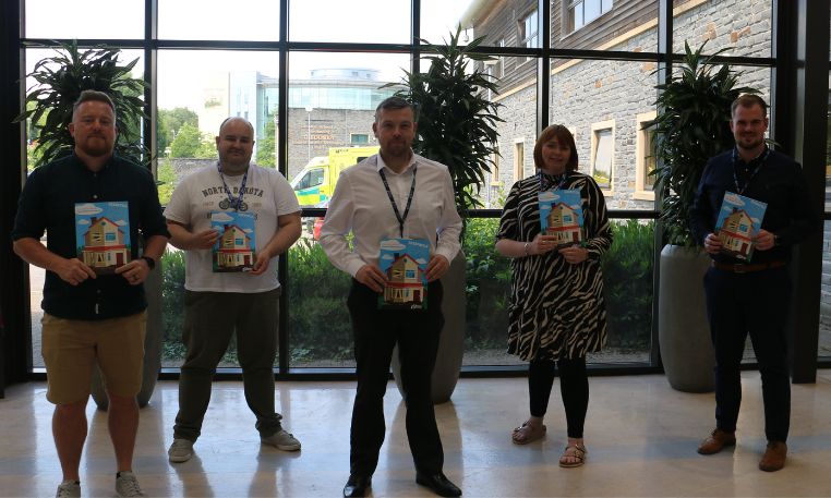 Cllr Shayne Cook launches the Empty Property Pack with members of the team